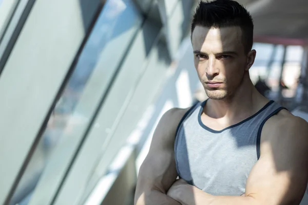 Portait of young fitness model training at home on rooftop — Stock Photo, Image