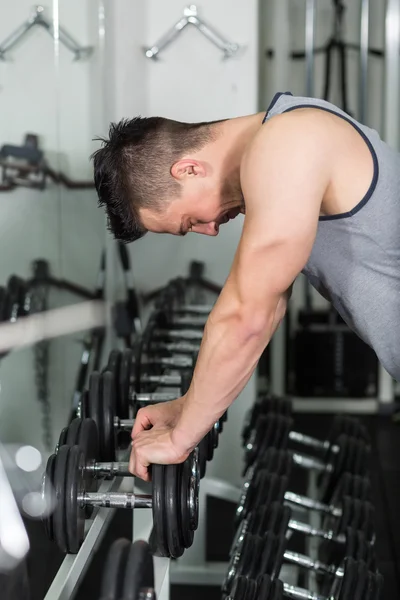 Man taking the heaviest weight — Stock Photo, Image