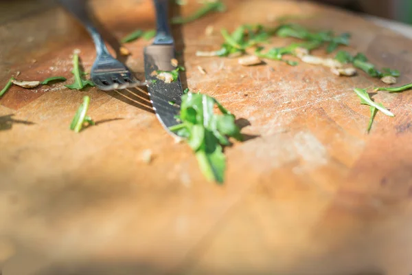 Empty wooden dish after food on wooden table