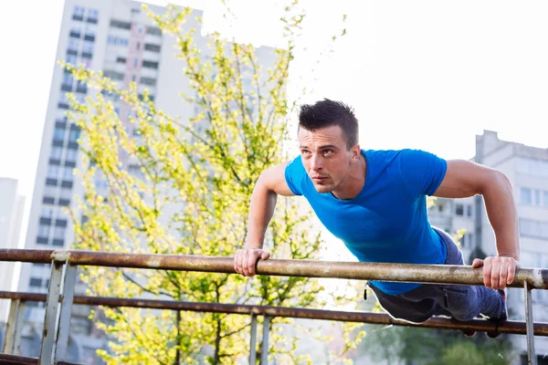 Street workout, confident sportsman