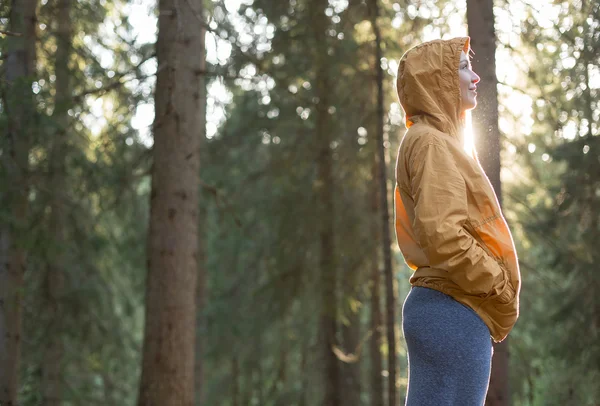 Young woman hiker enjoy the beautiful landscape at mountain peak — Stock Photo, Image