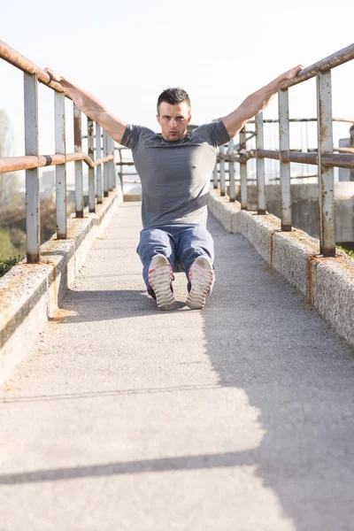 Male Runner streching — Stock Photo, Image