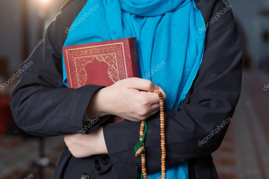 Young Muslim Girl Reading a Holy Book Stock Photo - Image of person,  muslim: 140789958