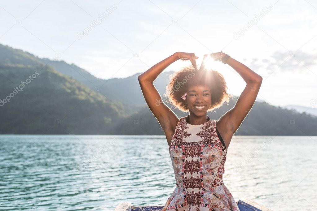 Beautiful girl enjoying boat ride