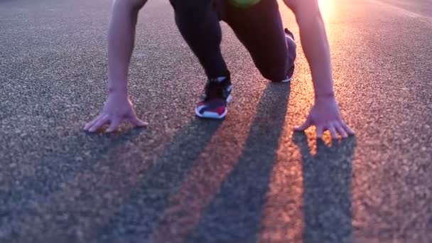 Man stretching at sunset — Stock Video