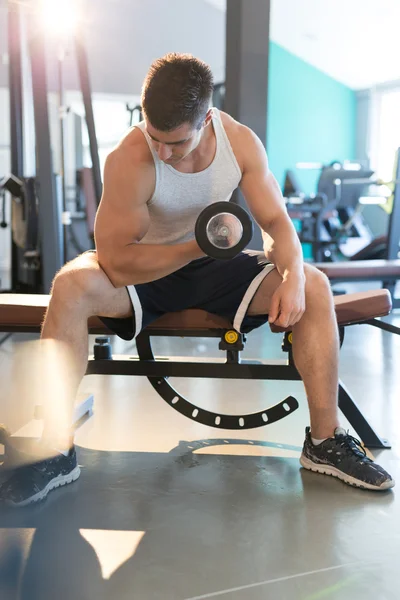 Man lifting dumbbell — Stock Photo, Image