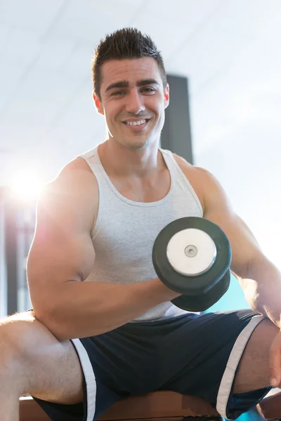 Man lifting dumbbell — Stock Photo, Image