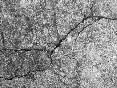 Çatlak beton dokuyu kapatma arkaplanı.