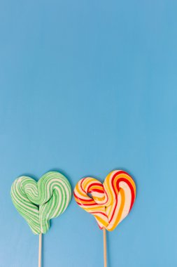 Kalp lolipop Sevgililer günü için ile turkuaz backgro şeklinde
