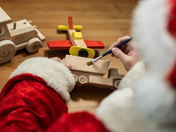 Noel Baba Bir Oyuncak Uçak Boyama Atölyesinde Oturmuş Yatay Kompozisyon — Stok fotoğraf