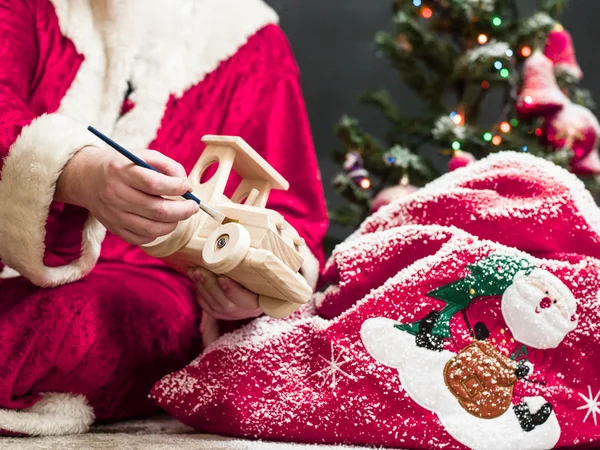Santa Claus malarstwo drewniane zabawki z gwasz — Zdjęcie stockowe