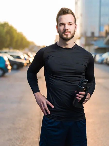 Férfi futó városi utcán portréja — Stock Fotó