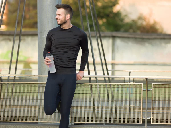 Jogging Healthy Looking Young Man Cross Bridge Under Morning Sun — Stock Photo, Image