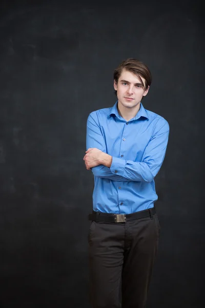 Retrato de um homem na frente de um quadro — Fotografia de Stock