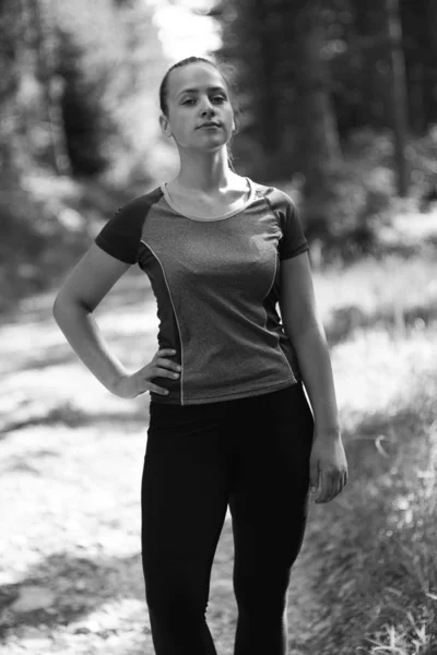 Attractive fit woman in sportswear training outdoors, female ath — Stock Photo, Image