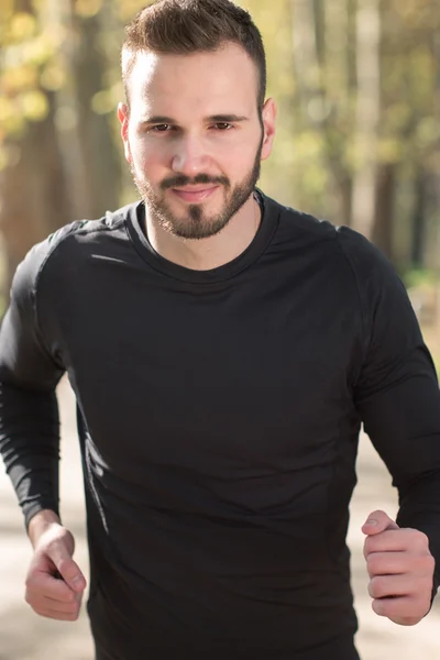 Hombre que corre - hombre subcampeón primer plano. Deporte atleta trotar trainin — Foto de Stock