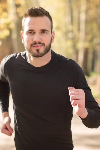 Běžící muž - muž běžec closeup. Sportovní sportovec zaběhat, ško — Stock fotografie