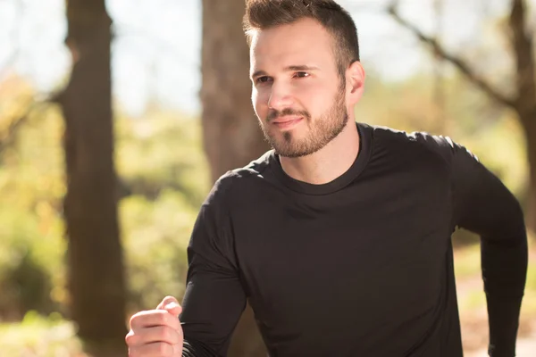 Running fitness man sprinting outdoors in beautiful landscape. F — Stock Photo, Image