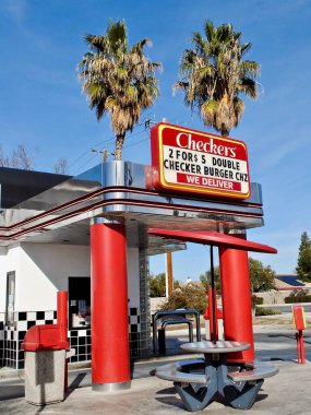 Checkers Drive-In Restaurants, Inc. is one of the largest chains of double drive-thru restaurants in the United States. The company operates Checkers and Rally's restaurants.  clipart