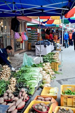Osan, South Korea: A open-air vegetable street market located outside of the main gate of Osan Air Base. Known as 