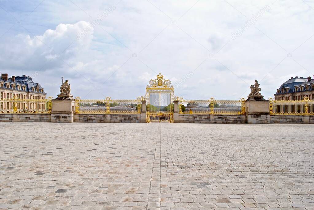 Versailles, France: Palace of Versailles, has a new golden royal gatean $8 million replica of a gate demolished during the French Revolution. Steel gate decorated with 100,000 gold leaves. 