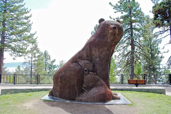 Tahoe City, California: Mother Grizzly Bear, and her two cubs, with fur made of 200,000 American and Canadian pennies. Named 