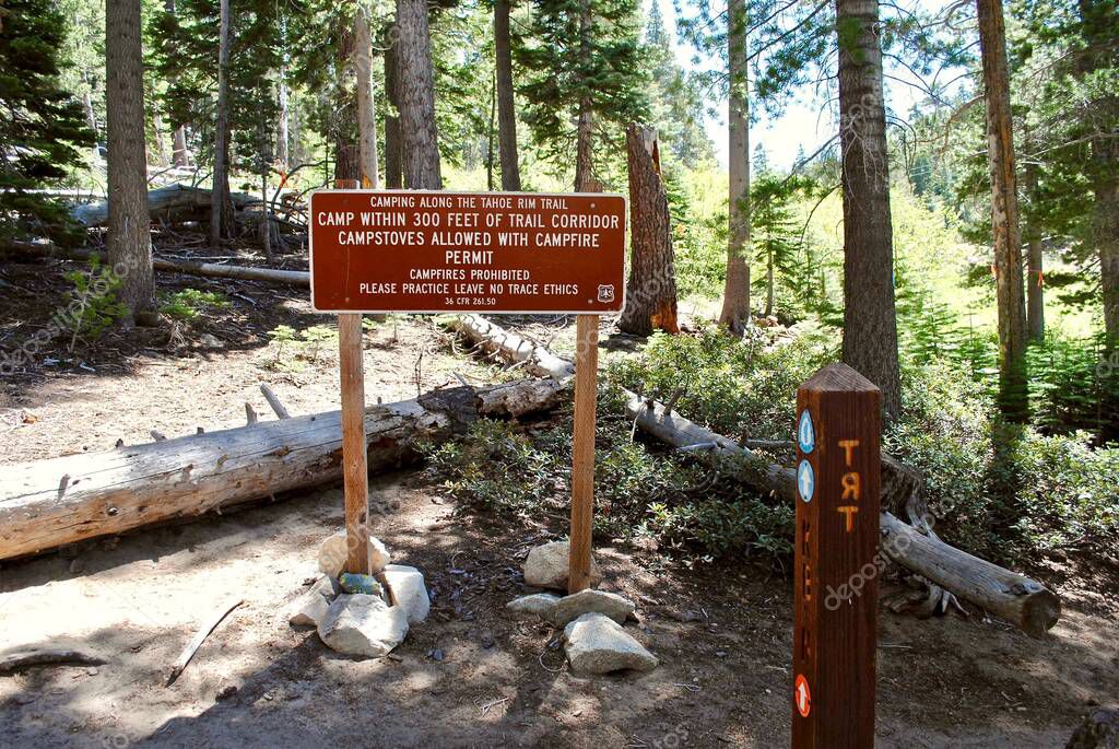 Stateline, Nevada: Tahoe Rim Trail signage. Located near Kingsburry South trail head and Heavenly Ski Resort. Signage regarding Tahoe Rim Trail camping, hiking, fires, stove, Leave no Trace.