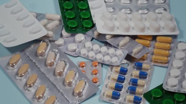 Sick Patient Searches Pills Blister Packs Blue Table — 图库视频影像