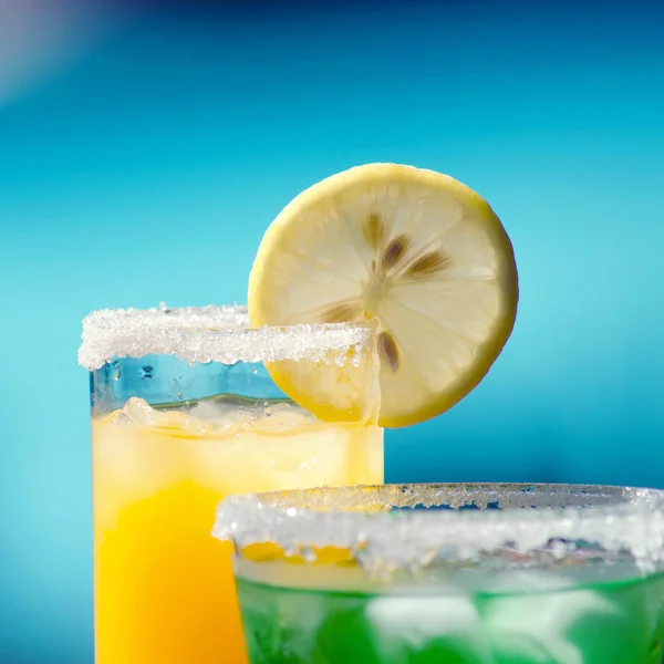 Two tropical cocktails near swimming pool — 스톡 사진