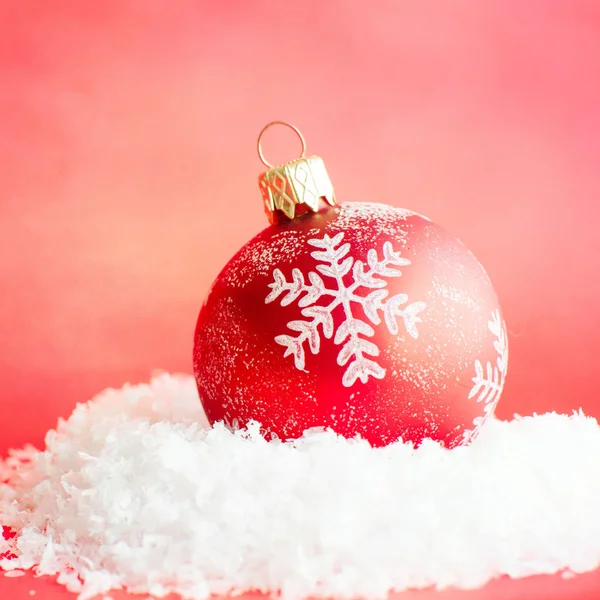 Christmas ball in the snow — Stock Photo, Image