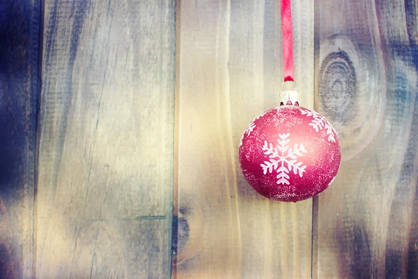 Weihnachtsdekoration über Holzgrund. — Stockfoto