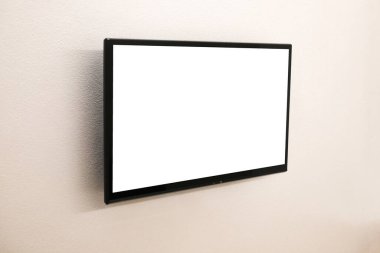 Tasarım, reklam tasarımı konsepti için duvarda LED TV boş beyaz ekran.