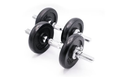 Dumbbell beyaz arkaplanda izole edildi.