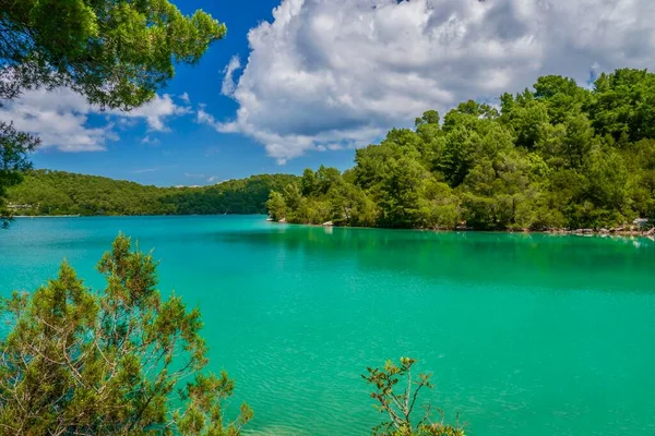 Beautiful turquoise color saltwater lake, Malo Jezero, on Mljet island, Adriatic Sea, Dalmatian coast, Croatia.