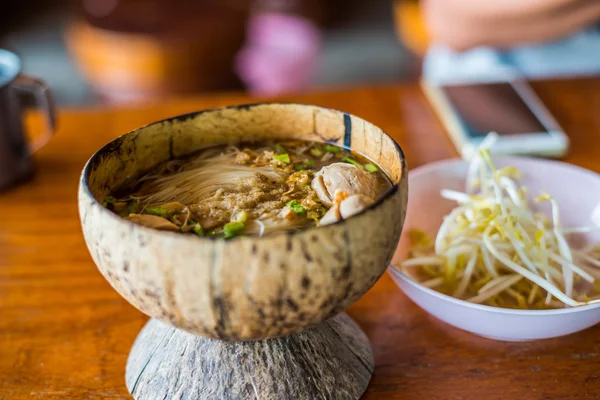 Thai food noodle in coconut shell — Stock Photo, Image