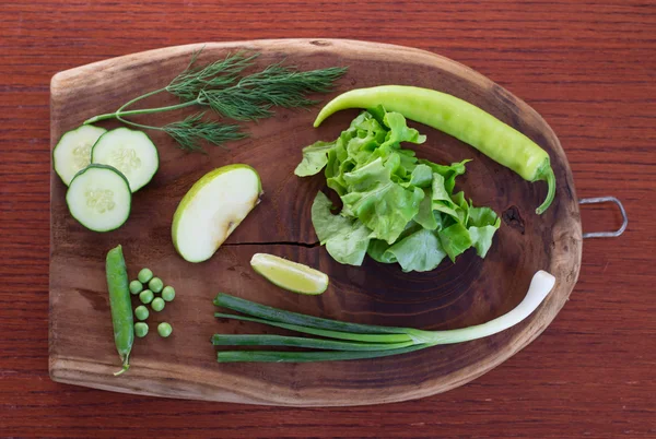 Green fruits and vegetables on the table — Stock Photo, Image