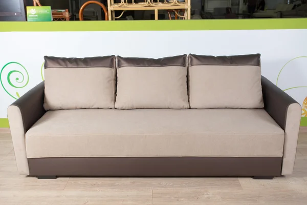 beige brown sofa on a white background