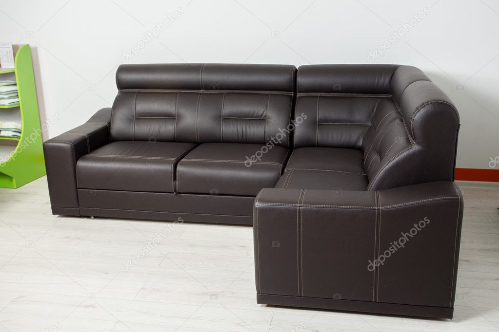 Angular Black Leather Sofa On A Neutral Background Stock Photo