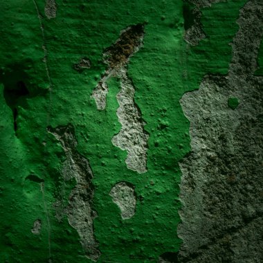 Parlak yeşil alçı ve koyu kenarlı beton bir duvarın deseni tasarım için grunge arkaplan