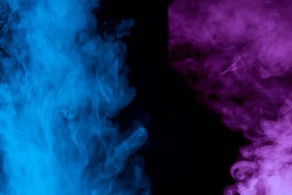blue and purple cigarette vapor on a dark background bright and mystical clouds breathtaking abstraction
