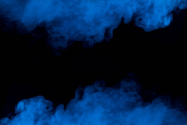 mysterious blue steam on a dark background breathtaking clouds smoking concept