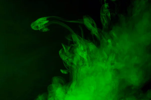 stock image mystical cloud of green cigarette vapor close up bright fantastic abstraction mysterious pattern