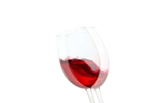 白を基調としたアルコールのオブジェに赤ワインが泡立ち — ストック写真