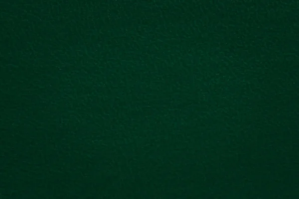 厚紙の滑らかな表面ではない濃い緑色のテクスチャデザインのためのクローズアップ背景 — ストック写真