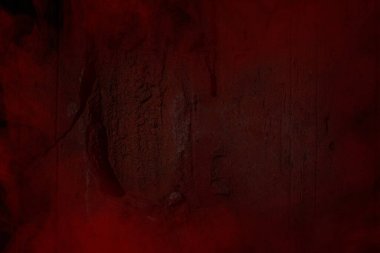 Cadılar Bayramı tasarım konsepti için gizemli ve gizemli arka planla kaplı kırmızı taş.