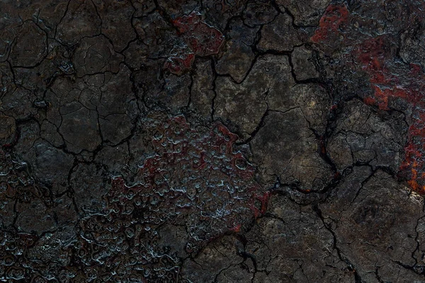 Tasarım için metalin yakın plan arkaplanındaki siyah is parçalarını kırdım.