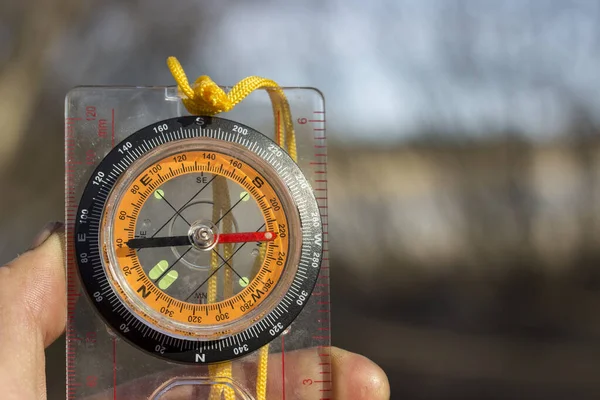 Compass Hand Brightly Illuminated Sun Blurred Background Nature Concept Tourism — Stock Photo, Image