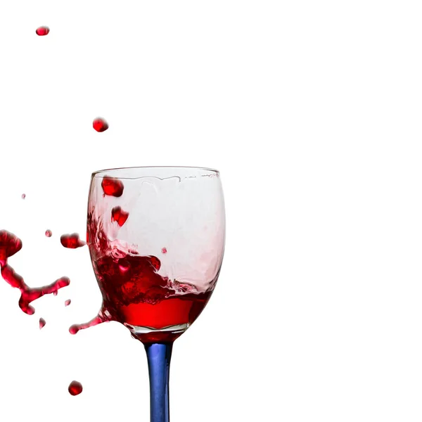 Spectacularly Bright Drops Red Wine Flying Out Glass White Background — Stock Photo, Image