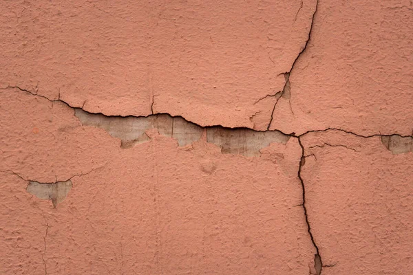 çatlamış ve soyulmuş boyalarla kaplı beton duvar tasarım için yakın plan