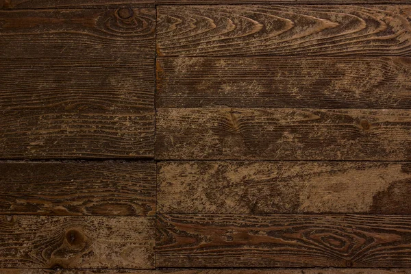 自然パターンと部分的に引き裂かれた表面を持つヴィンテージボードの茶色の木の質感デザインの背景 — ストック写真
